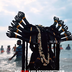 Devotee dressed as a multi-armed goddess during Kulasai Dasara festival in Kulasekarapattinam, Tamil Nadu